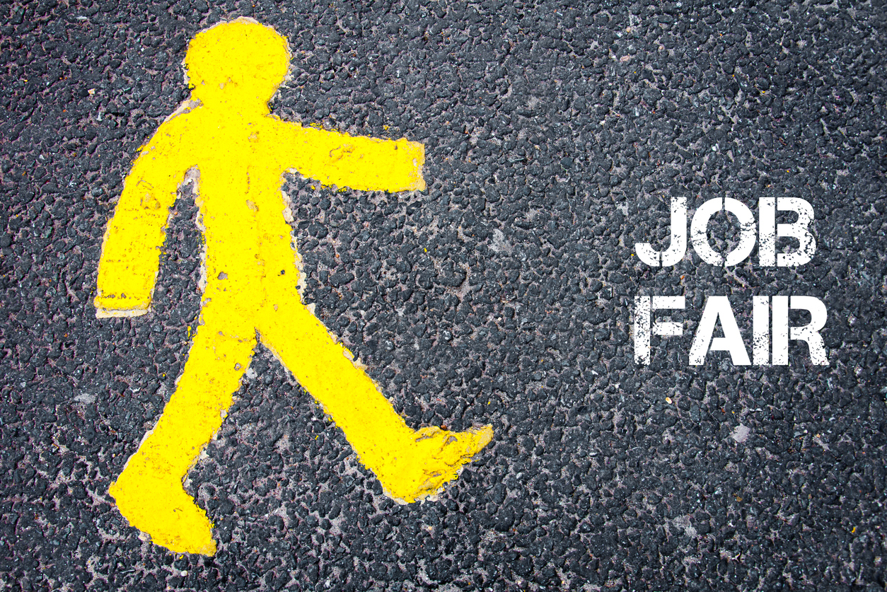 Yellow pedestrian figure walking towards JOB FAIR