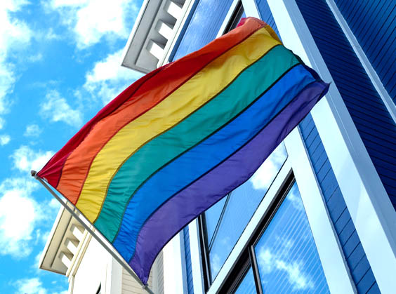 Gay pride, LGBT flag handing outside of a house